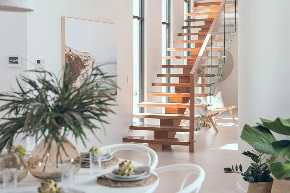 Light-filled open timber staircase